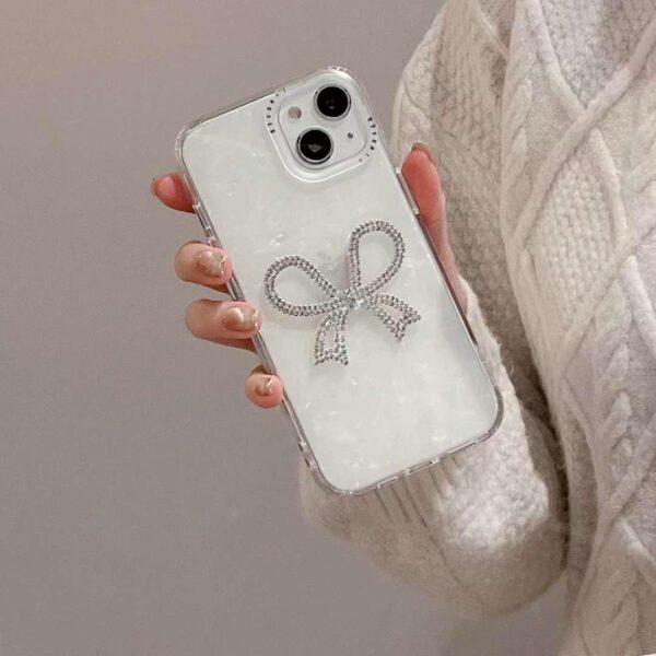 Diamond Studded Bow with Transparent Marble Effect cases for iPhone